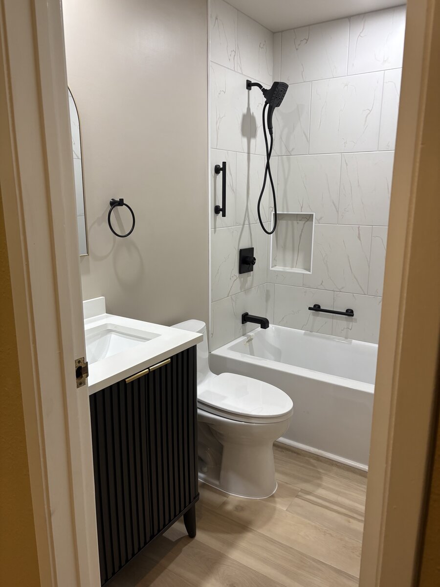 Bathroom renovation detail showing quality tile work